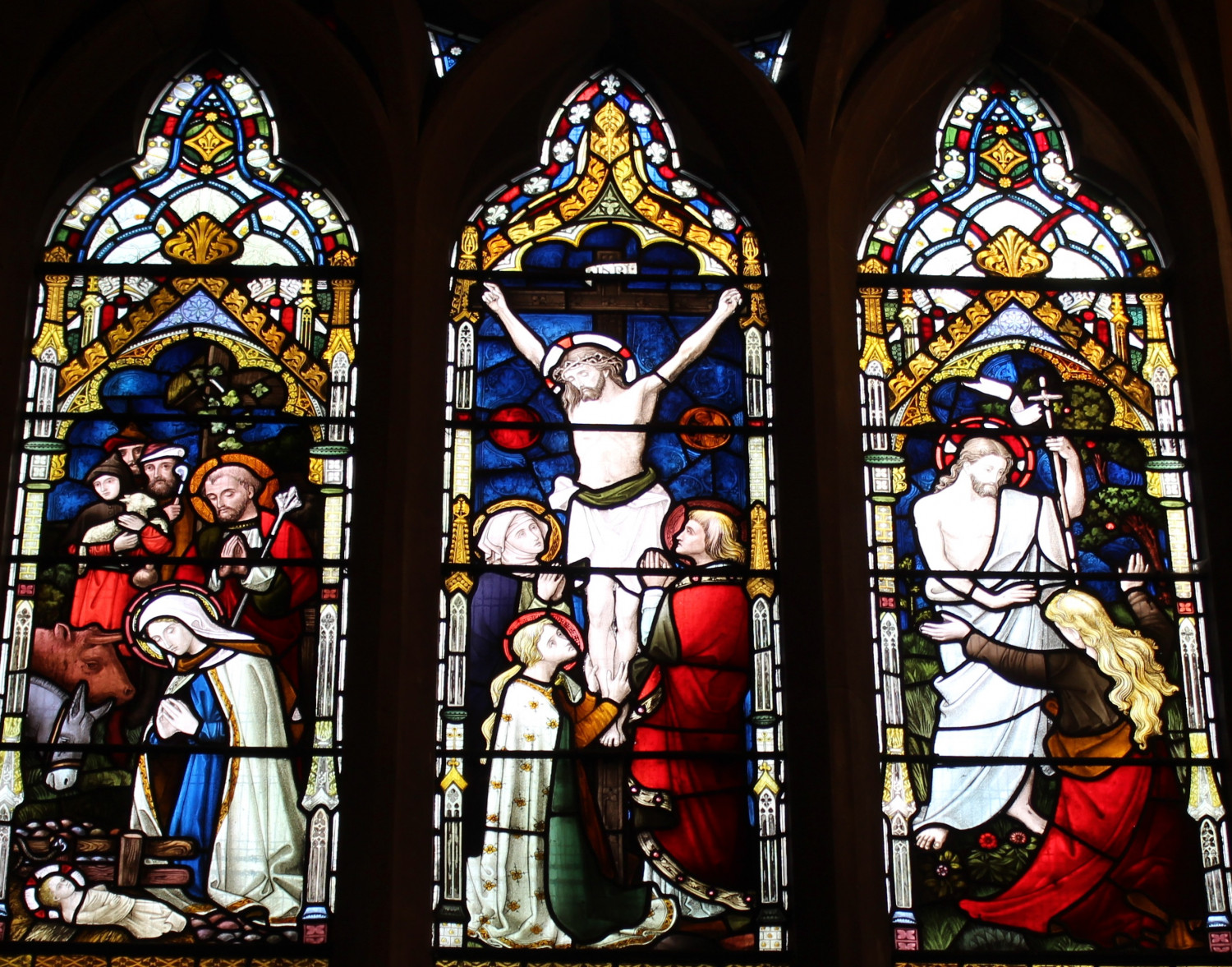 Stained glass window behind the altar at All Saints